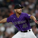 Starting pitcher Chad Kuhl of the Colorado Rockies throws against the Philadelphia Phillies in the fourth inning at Coors Field.